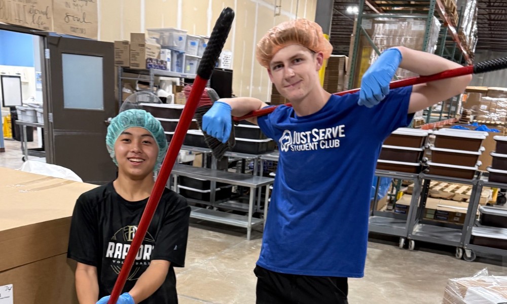 JustServe Club from East Ridge High School, Woodbury MN serves at Feed My Starving Children
