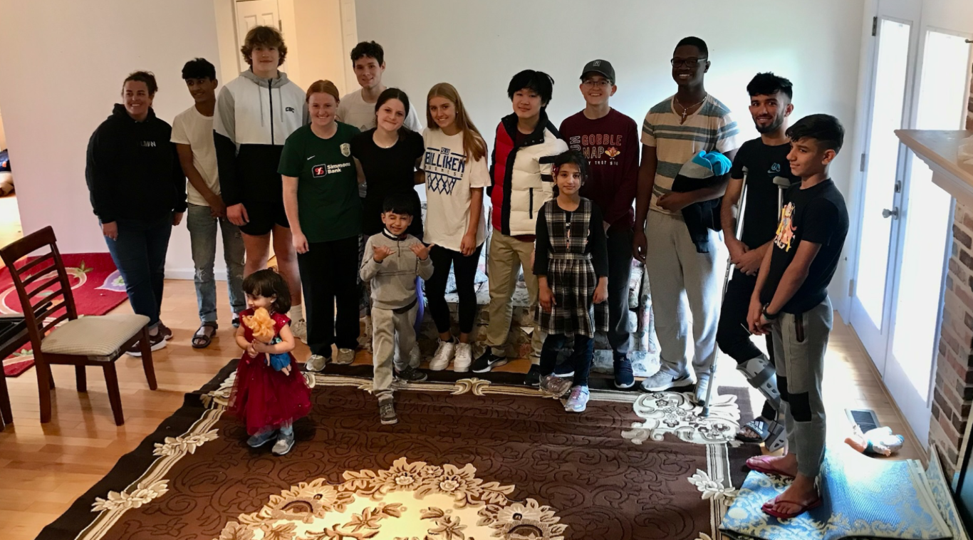 Many helping hearts and hands move large Refugee Family - JustServe